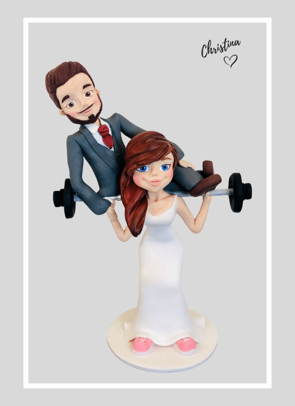 Fun weightlifting custom made wedding cake topper