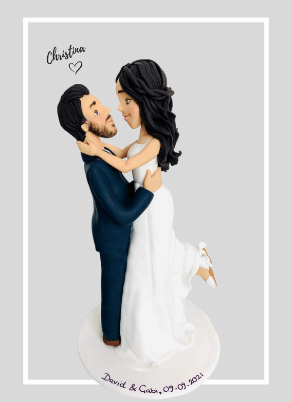 gazing into each others eyes custom made wedding cake topper