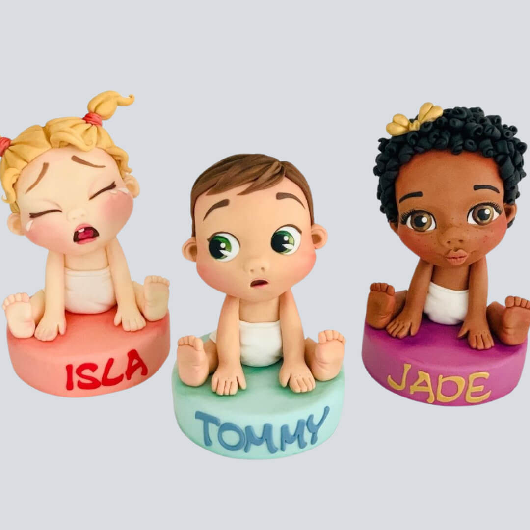 how to make afondant baby cake topper in our online cake decorating course